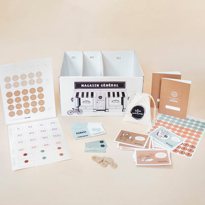 Version française du Magasin Général, un système de motivation et récompense par Les Belles Combines - Ensemble de la boite